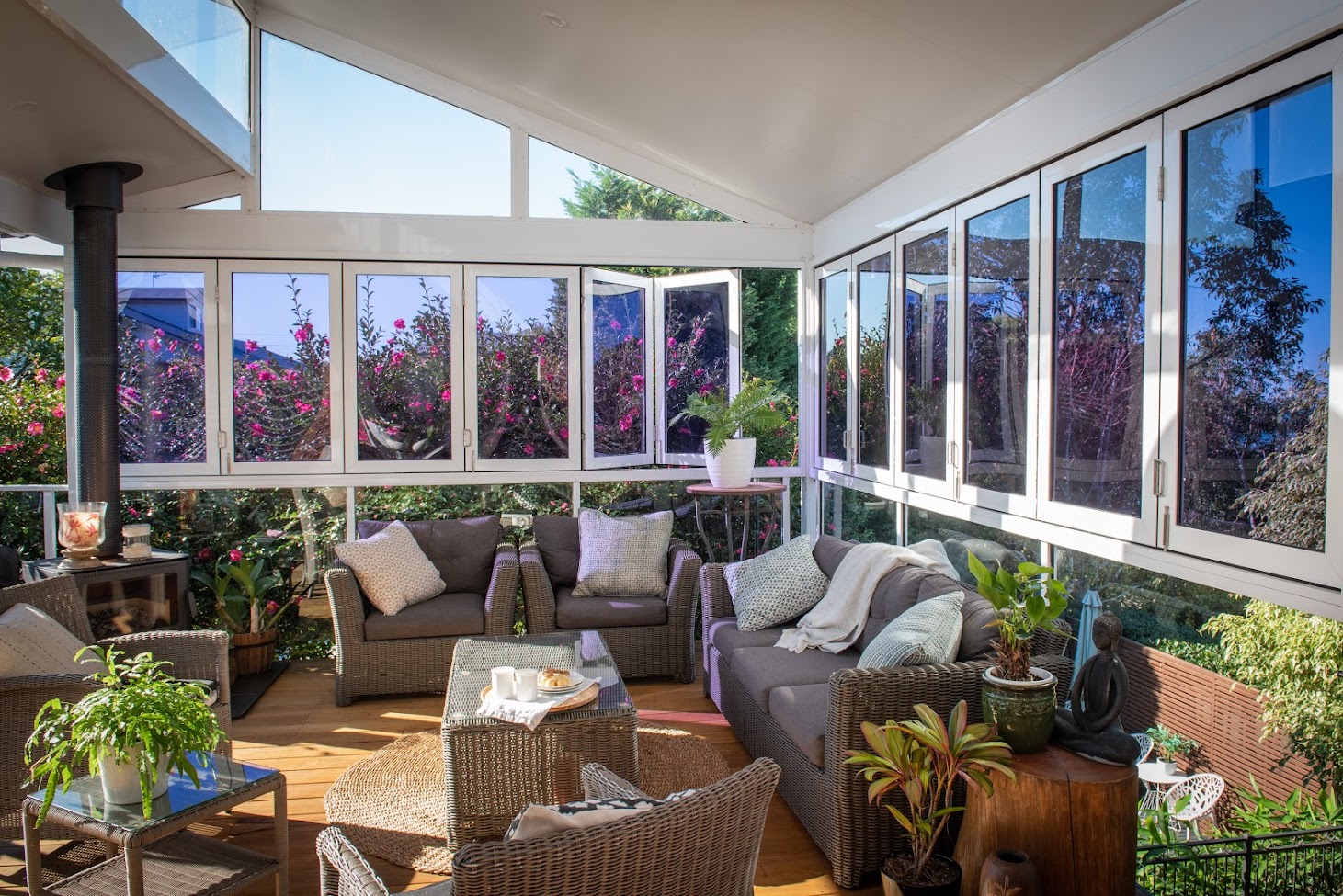 A well-designed sunroom featuring large windows and insulated panels.