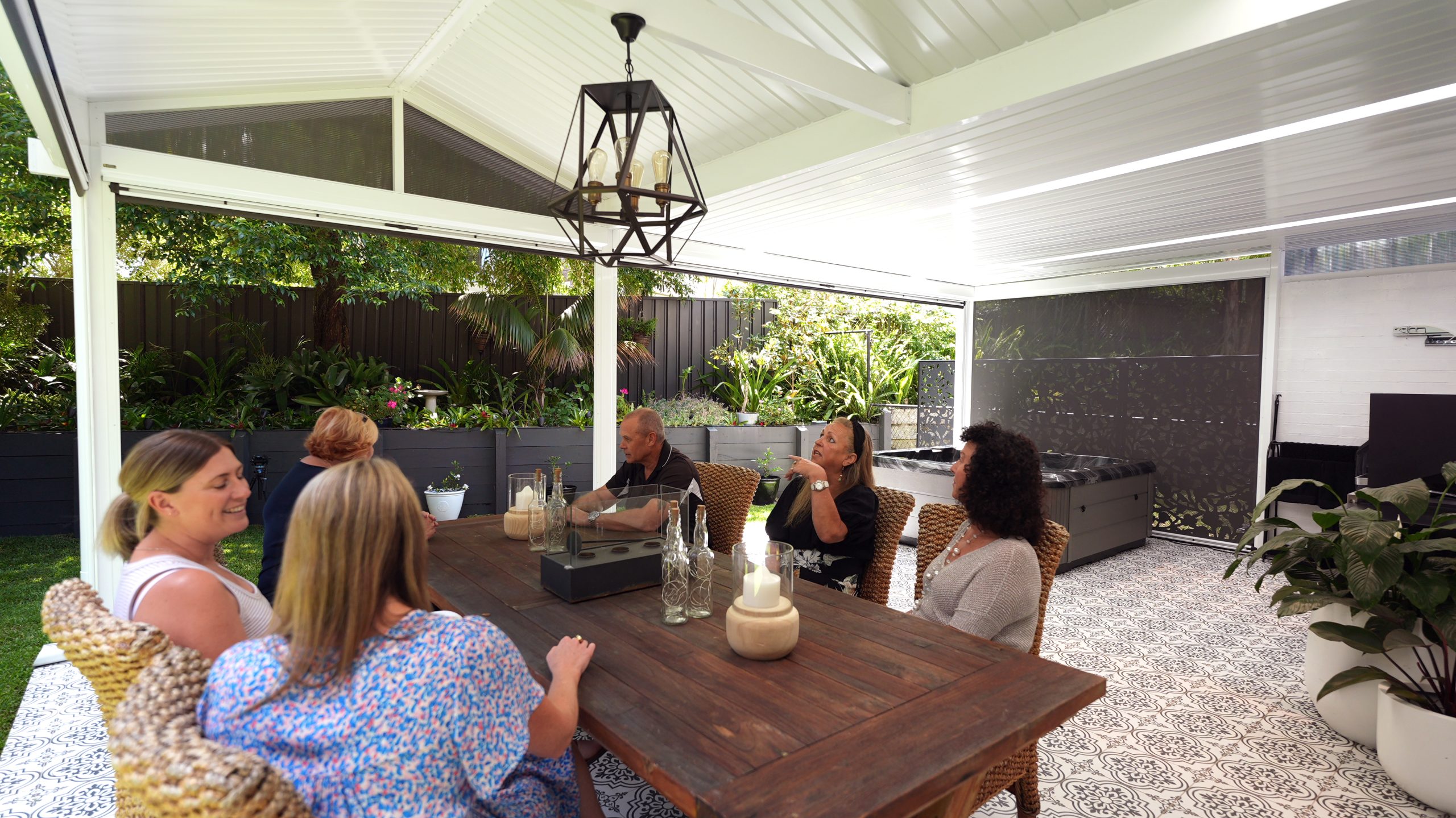 Indoor Outdoor louvred room with a Spanlite in the patio roof